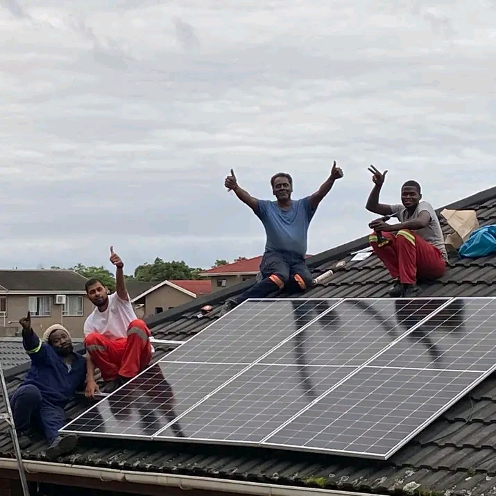 Solar installation team on a Durban rooftop